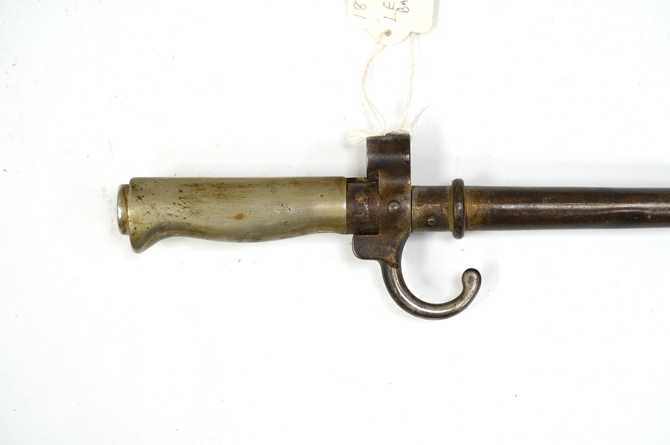 An 1886 French Lebel bayonet and scabbard. Condition - good